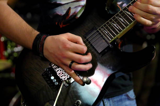 istock In rock bands, the main and necessary string instrument is usually an electric guitar. 890612350
