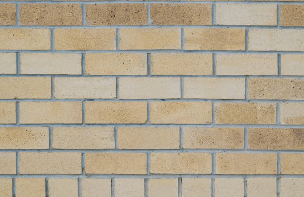 istock Texture of a colored brick with cement wall,  abstract background for print design 890629108
