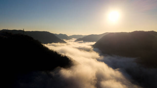 istock Sun rises above the clouds in Japan deep in the mountains 890629192