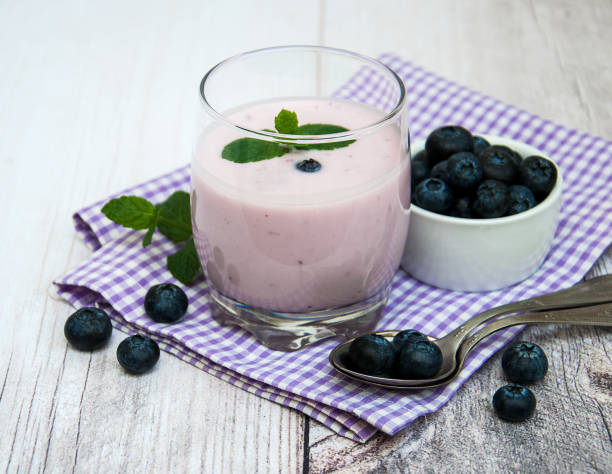 istock Glass with blueberry yogurt 890631796