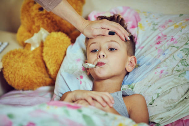 istock The boy is undergoing treatment in the hospital. 890637808