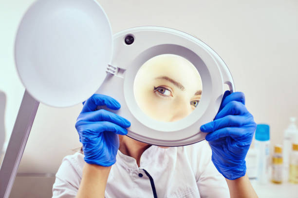 istock The cosmetologist is caring for the patient's face 890637968