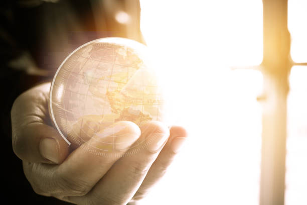 istock Businessman holding Earth globe model ball map with Radar background in hands. Concept for global business, communications, politics  environmental for learning world wide in online market. 890666400