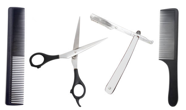 istock Comb with scissors and razor on a white background 890669198