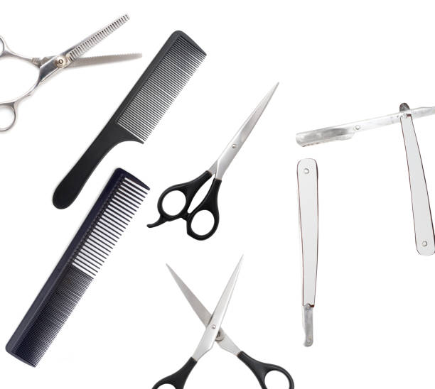 istock Comb with scissors and razor on a white background 890669386