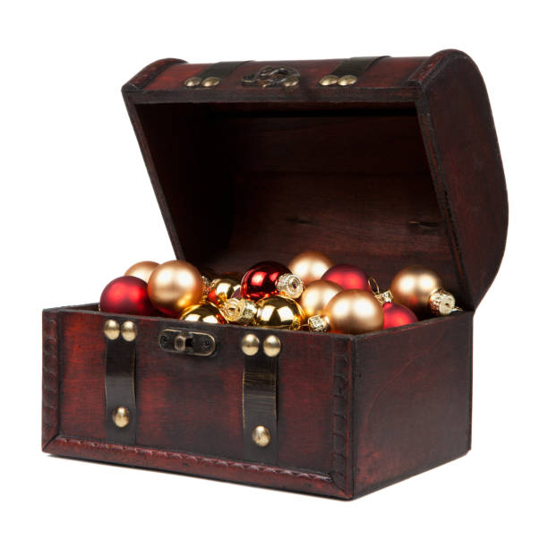 istock Christmas decorations in an old vintage suitcase isolated on white 890686956