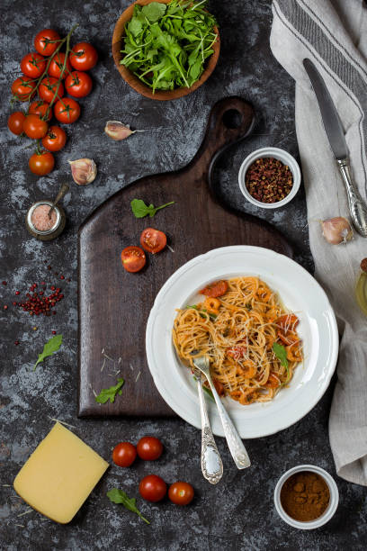 istock Spaghetti with shrimps and tomato sauce 890689814