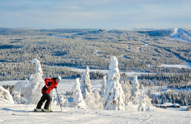 istock Woman downhill skiing 890699412