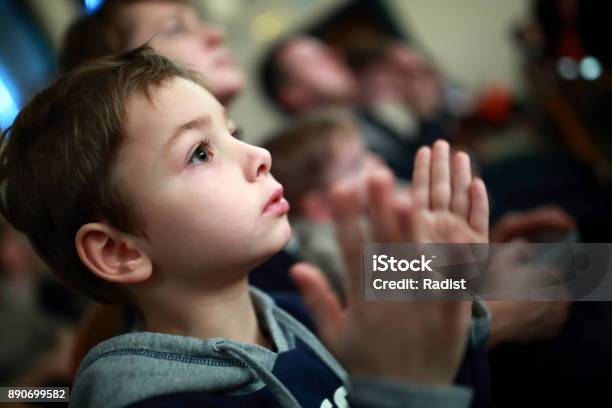 Boy Applauding In Theater Stock Photo - Download Image Now - Child, Offspring, Theatrical Performance