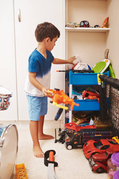 istock It's about time I pack my toys away 890705710