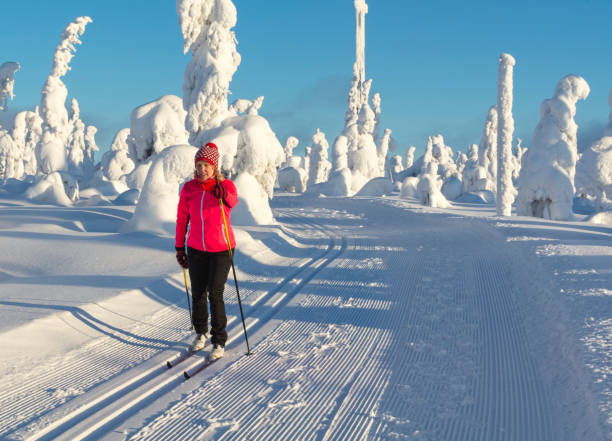 istock Woman cross country skiing 890705748