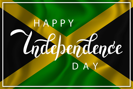 Vector isolated handwritten lettering for 6th August Happy Independence Day in Jamaica on the realistic flag background. Vector calligraphy poster for greeting card and covering.