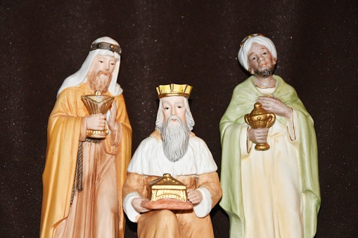 Three ceramic figurines from old nativity scene.