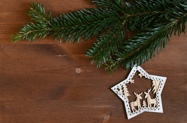 istock Christmas holiday background - decoration on a wooden table with xmas tree 890719280