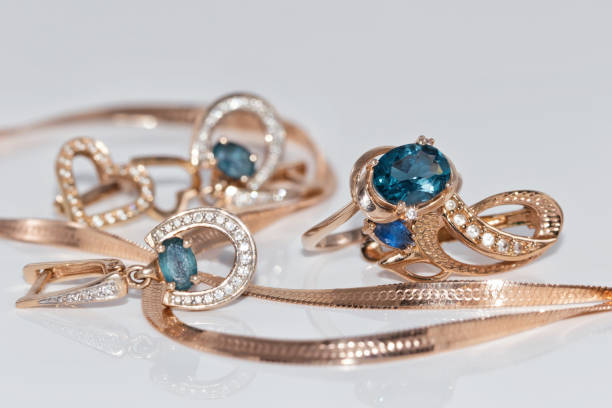 istock Gold earrings and ring with blue Topaz 890719390