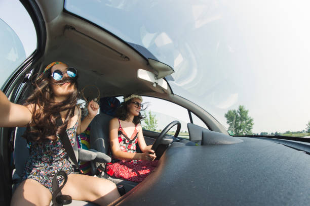 istock Women having fun in a road trip 890721846