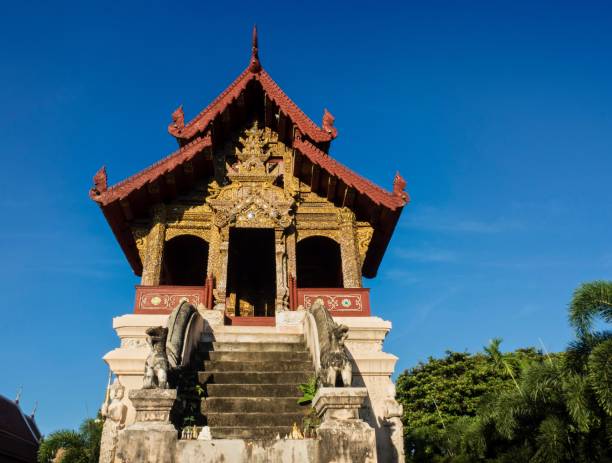 istock Wat Phra Singh Temple On Blue Sky Background 890723108