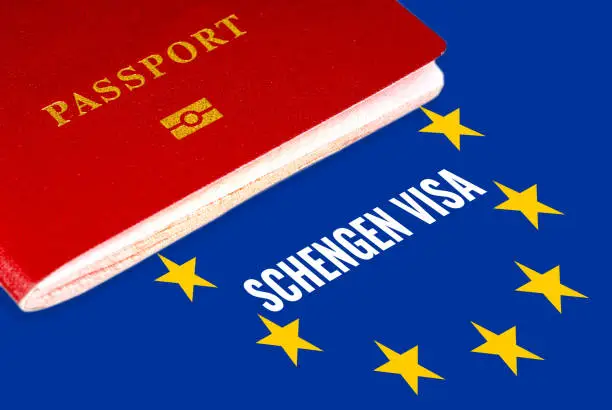 schengen visa, white text over eu flag and passport
