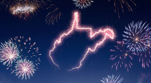 istock Night sky with fireworks shaped as West Virginia.(series) 890733272