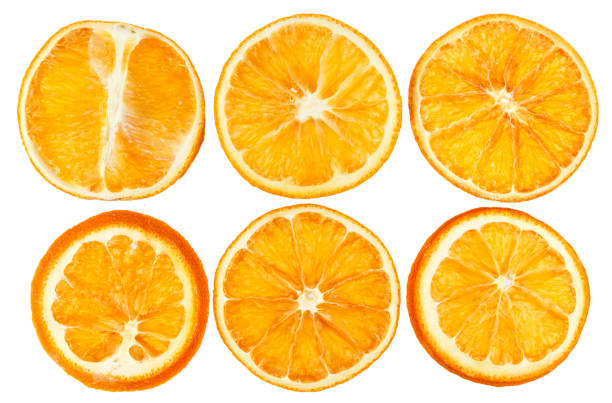 istock Dried oranges isolated on white background closeup 890733278