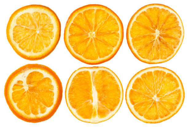 istock Dried oranges isolated on white background closeup 890733354