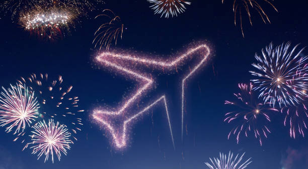 Night sky with fireworks shaped as an airplane.(series)