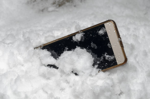 istock mobile phone accidentally fell out and got lost in the snow 890743638