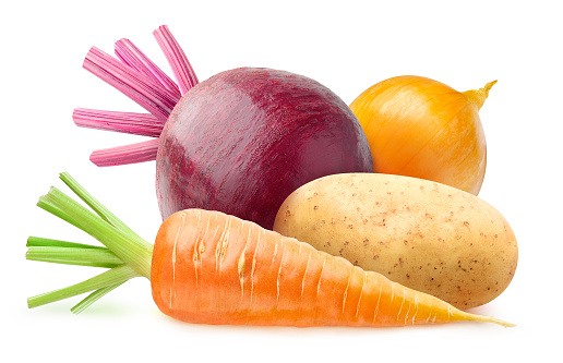 Isolated root vegetables. Raw carrot, potato, beetroot and onion isolated on white background with clipping path