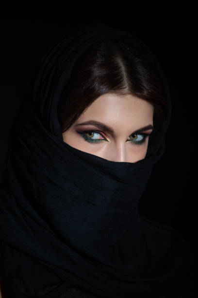 istock Woman in niqab 890751442