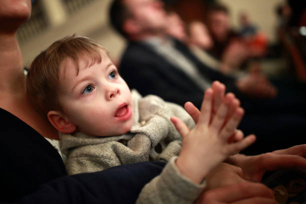 istock Child applauding in theater 890752218