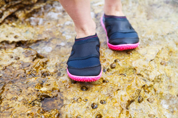 istock Woman in water shoe 890760798