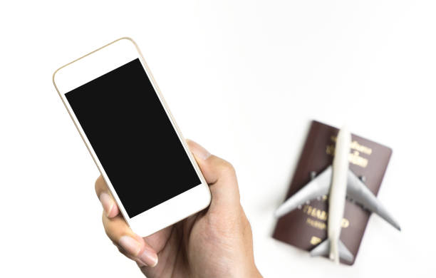 istock Empty mobile phone screen isolated on white for travel concept 890763706