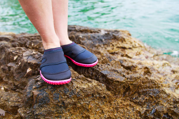 istock Woman in water shoe 890764252