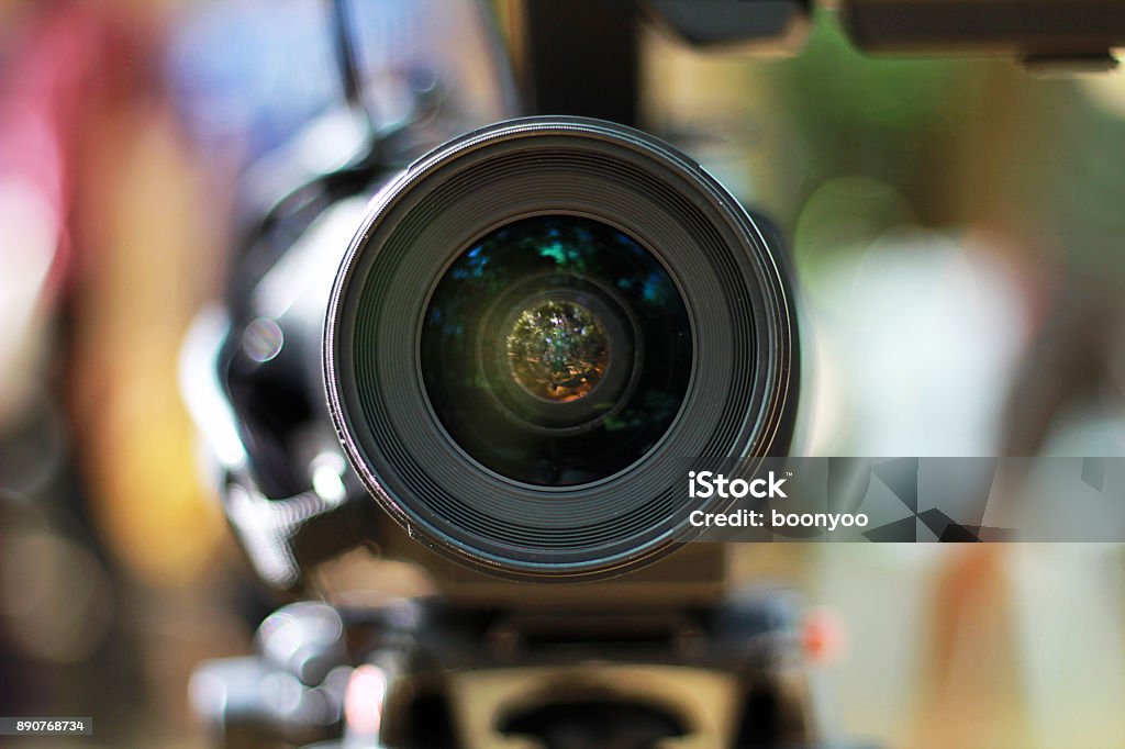 Video Camera Lens Front camera lens photo. Home Video Camera Stock Photo