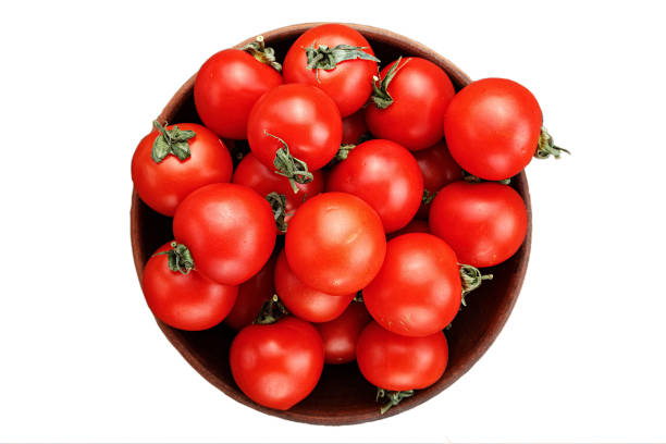 istock fresh cherry tomatoes in a clay plate 890771646