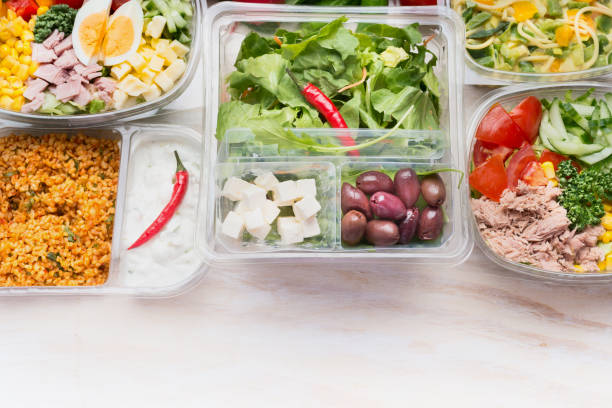 istock Various Healthy salad bowls in plastic package for diet lunch 890778868