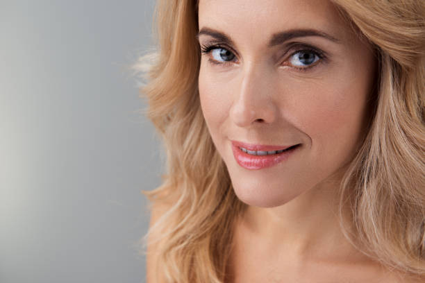 istock Charming positive lady is posing with smile 890789932