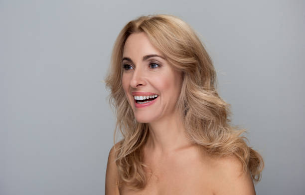 istock Joyful adult female is laughing 890790212