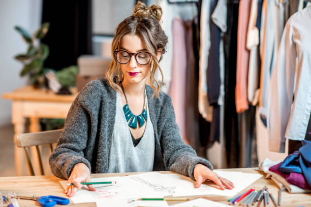 istock Fashion designer working at the office 890797468