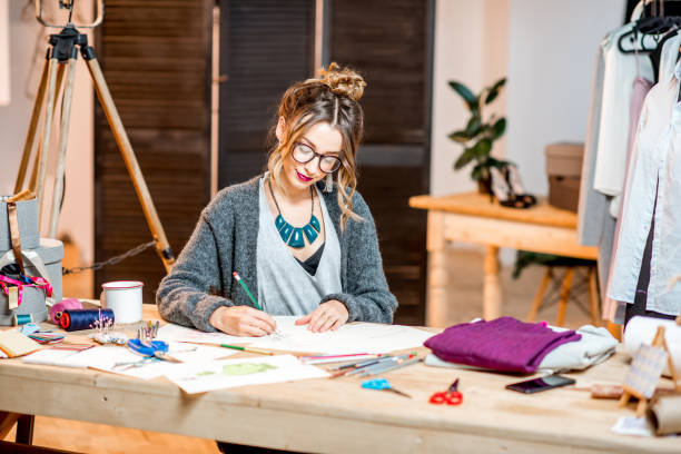 istock Fashion designer working at the office 890802948