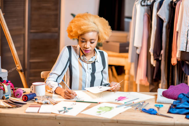 istock Fashion designer working at the office 890803434