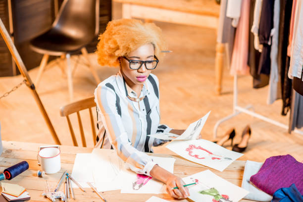 istock Fashion designer working at the office 890803774