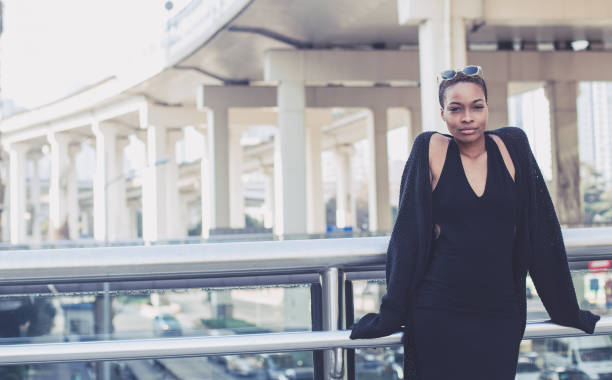 istock Lovely woman dressed in black 890813252