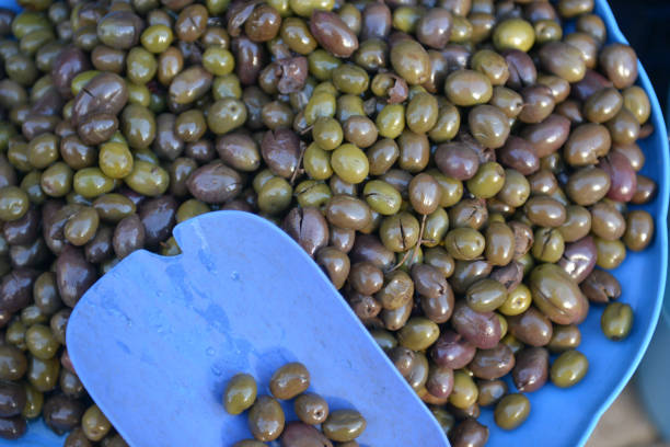 istock Barrels of olives for sale 890813510