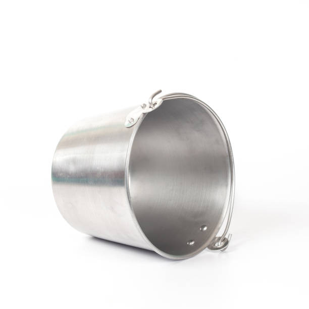 istock Old aluminum bucket isolated on white background 890813552