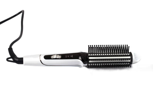 istock straightener and hair curler with comb 890813774