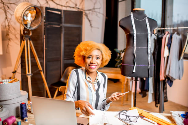 istock Fashion designer working at the office 890818758
