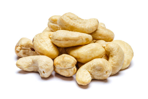 istock Roasted cashew nuts isolated on white background. Clipping path 890822088