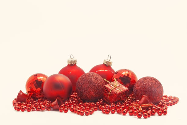 istock Christmas decoration, balls, beads, bell close up isolated 890860484