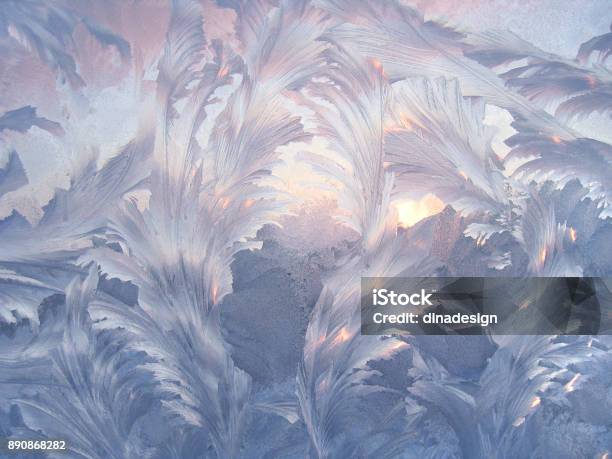 Beautiful Ice Pattern And Sunlight On Winter Window Glass Stock Photo - Download Image Now